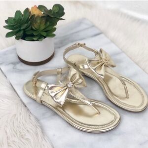 NWT Kate Spade gold bow tie strapped thong sandals size 6.5